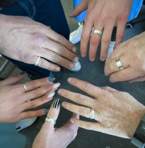 Silver Hammered and Stamped Rings on hands made at BENCHspace