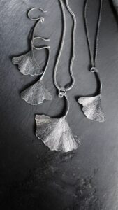 handmade silver ginkgo leaves as earrings and pendants